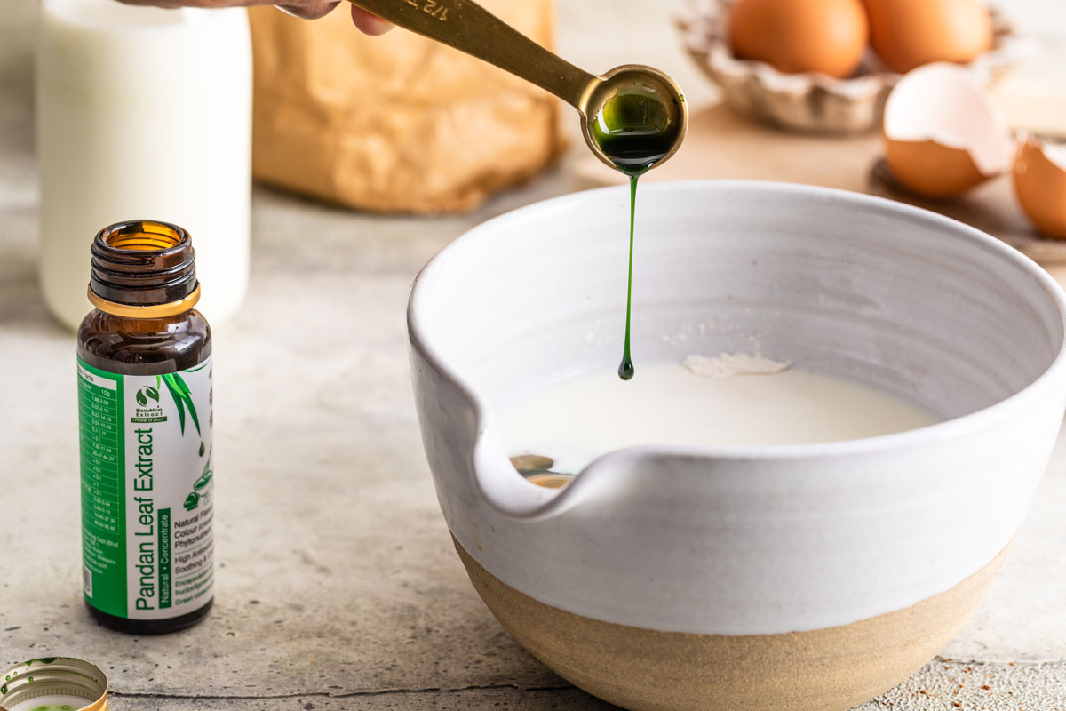 Pandan extract being added to batter