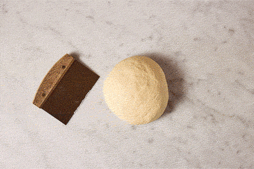 An animation showing how to use a bench knife to equally portion a ball of dough into 8 pieces and then roll each into a perfect ball.