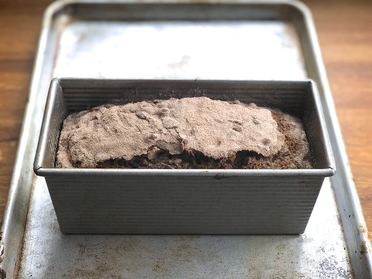 Banana bread with extra chocolate chips and chopped walnuts baked in a 9" x 4" pan