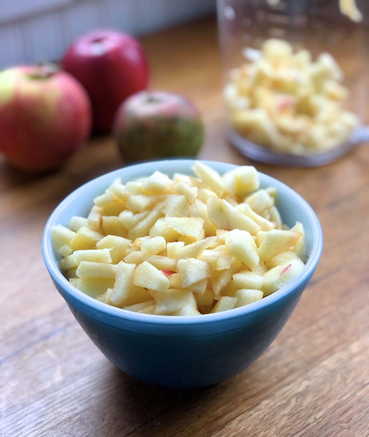 Bowl of diced apples ready to be made into apple pie filling.