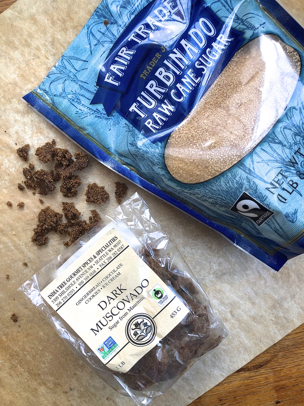 Bags of turbinado and muscovado sugar.