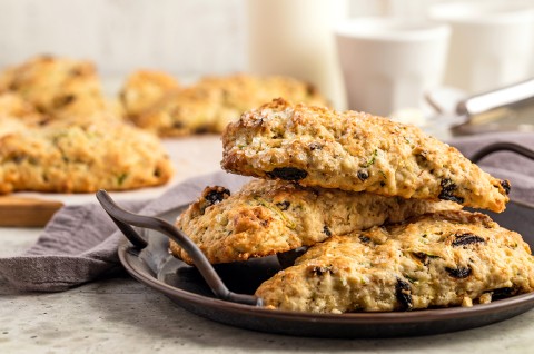 A small plate with a stack of zucchini scones, ready to be served - select to zoom
