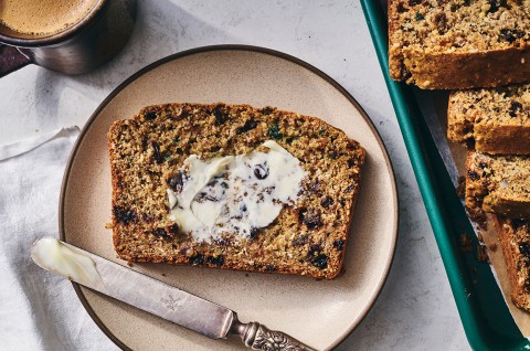 Rye Soda Bread on a plate with butter spread - select to zoom