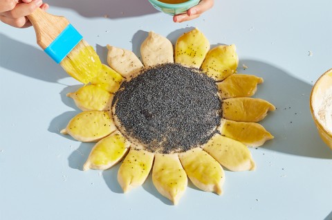 Sunflower Bread brushing on butter - select to zoom