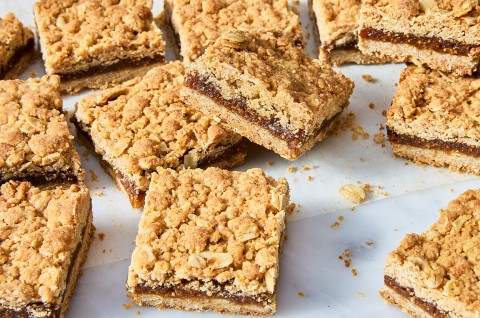 Brown Sugar and Oat Fig Bars on a counter - select to zoom