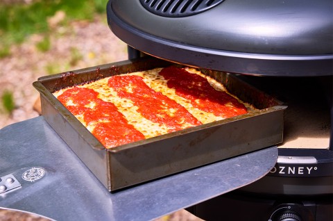 Pizza Oven Detroit Pizza coming out of the pizza oven - select to zoom