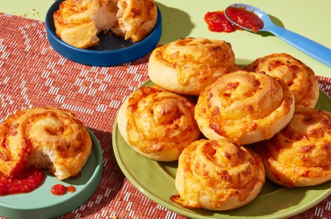 Pizza Party Buns served on plates with some tomato sauce - select to zoom