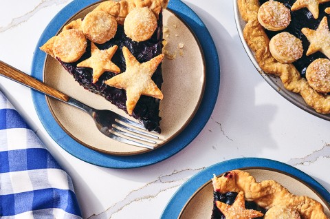 Fresh Blueberry Pie sliced up and served on plates - select to zoom