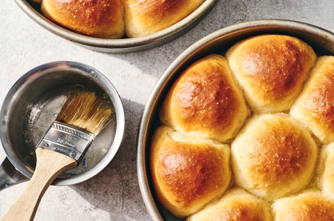 Golden Pull-Apart Butter Buns and a brush with clarified butter for topping - select to zoom