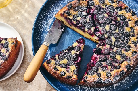 A sliced-up Blueberry Breakfast Cake on a plate - select to zoom