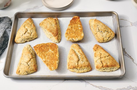 Lemon poppy seed scones baked on nested sheet pans