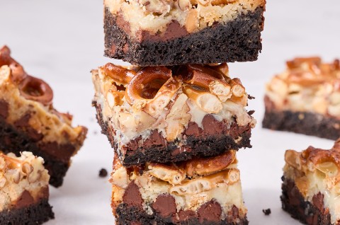 A stack of three gluten free seven chocolate layer bars. - select to zoom
