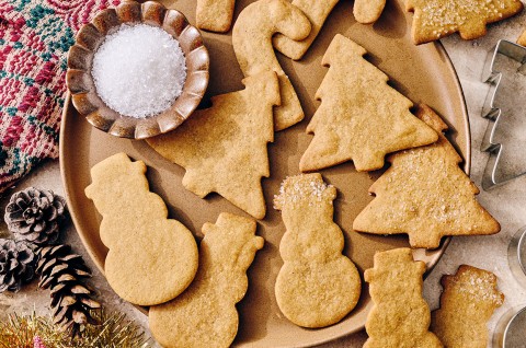 Light Spice Holiday Cookies on a plate with decorative holiday accents. - select to zoom