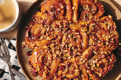 Sticky Buns seen from above showing caramelized topping and nuts. - select to zoom