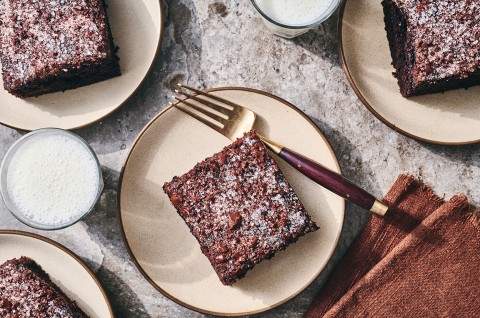 Chocolate Olive Oil Cake on a plate. - select to zoom