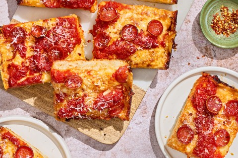 Slices of Weeknight Detroit Pizza arranged on a table. - select to zoom