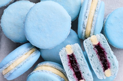 Pile of macarons with one split in half