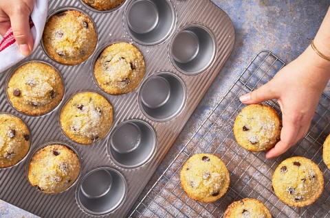 Removing Easy Chocolate Chip Muffins from a muffin pan - select to zoom
