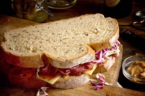 Two slices of caraway rye bread turned into a sandwich, one King Arthur's many rye bread recipes. - select to zoom