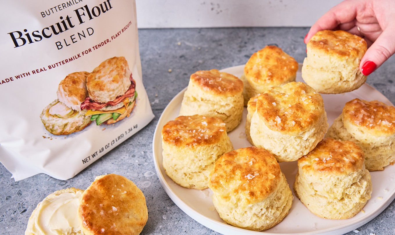 3-Ingredient Buttermilk Biscuits on a plate with a bag of flour