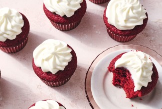 Red Velvet Cupcakes, one with a bite taken out