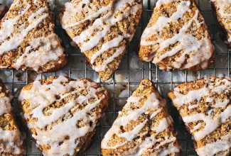 Cinnamon Whole Wheat Scones on a cooling rack, glazed