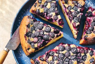 Several slices of Blueberry Breakfast Cake on a plate