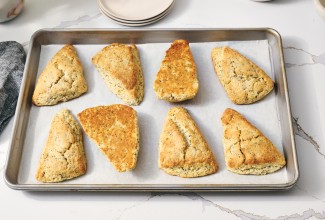 Lemon poppy seed scones baked on nested sheet pans