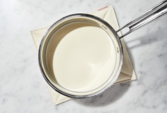 Heavy cream in a saucepan