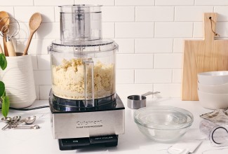 Food processor being used to make almond paste
