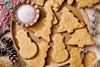 Light Spice Holiday Cookies on a plate with decorative holiday accents.