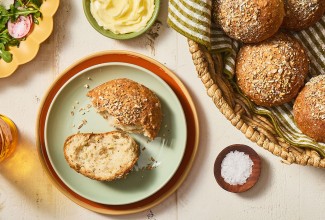 A Gluten-Free Seeded Hearth Roll split on a plate.
