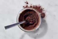 Cocoa powder in a bowl with a spoon