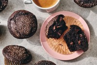 A Chocolate Breakfast Muffin broken open on a plate