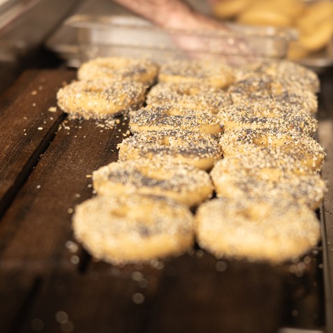 Raw bagels before going into the oven. - select to zoom