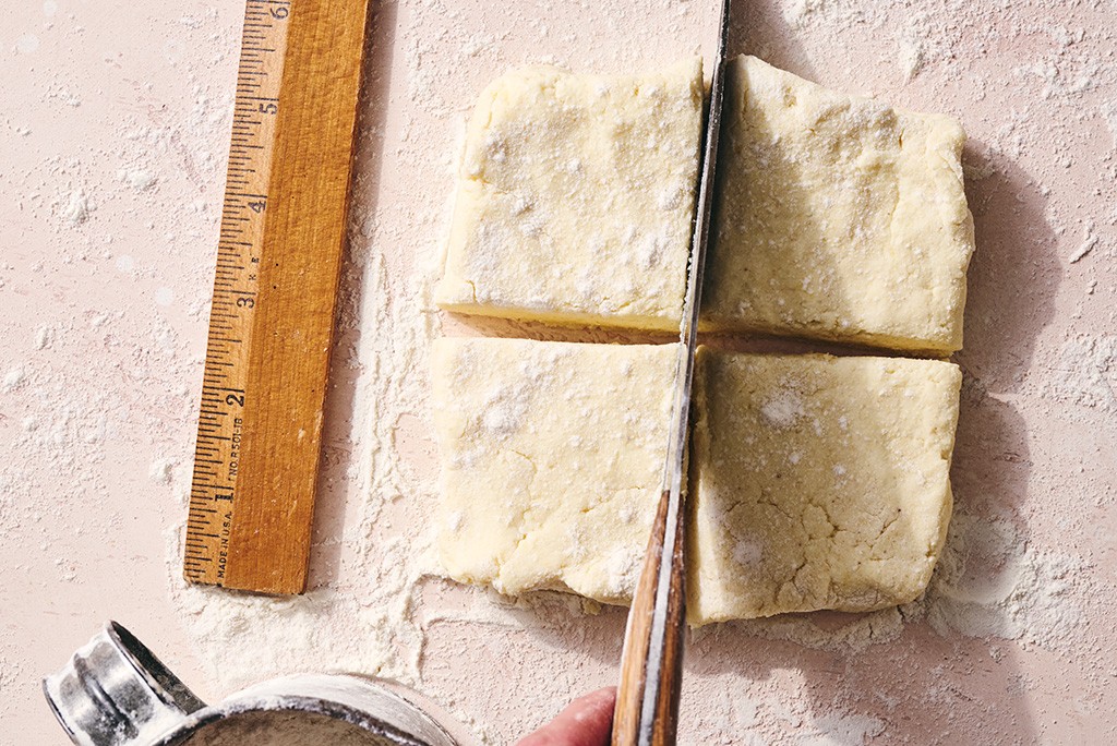 Gnocchi dough being cut into quarters