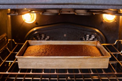 Chocolate cake baking in the oven