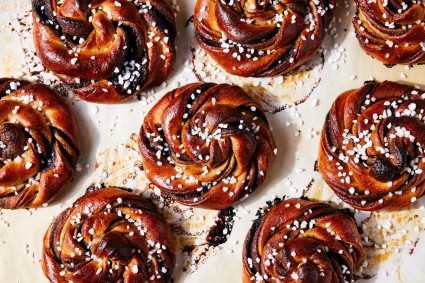Overhead shot of buns with pearl sugar sprinkled on top. 