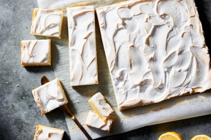 Overhead shot of bars cut into slices on a cutting board.