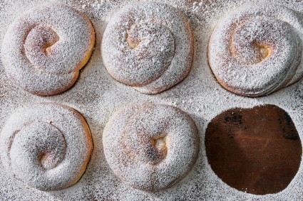 Mallorcas dusted with confectioners' sugar