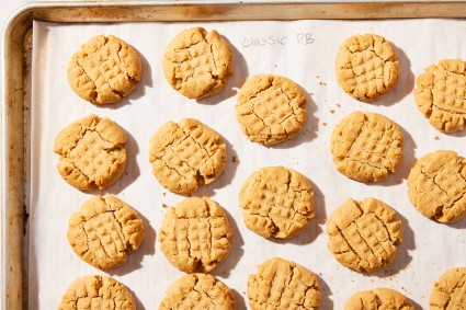 Freshly baked Classic Peanut Butter Cookies on a sheet pan