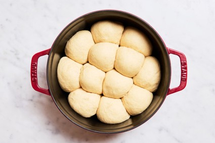 Proofed dinner rolls in Dutch oven
