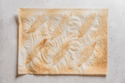 Slightly browned, used parchment paper 