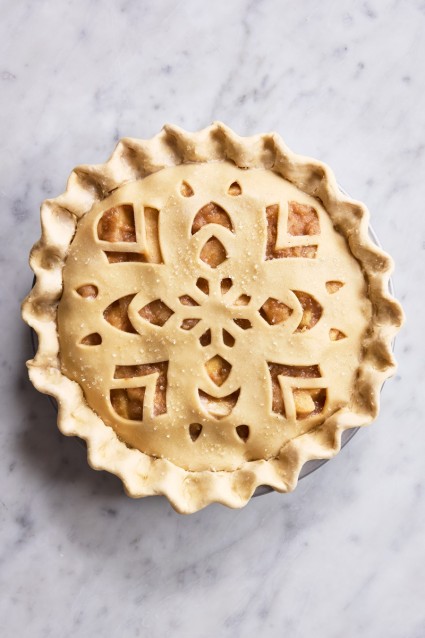 Unbaked pie with a design in the crust