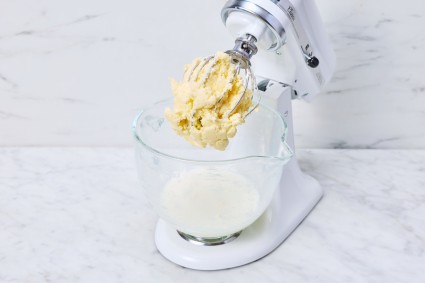 cultured butter in a stand mixer with solids and liquids separated