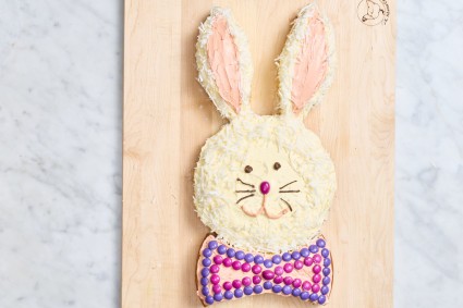 Easter bunny cake on a wooden cutting board