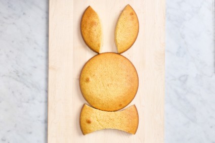 Yellow cake cut and assembled to resemble a bunny shape