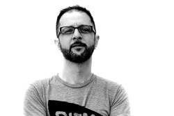 A headshot of Andrew Janjigian