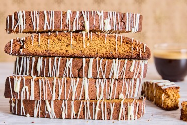Gingerbread Biscotti stacked high on a counter