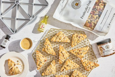 Fruitcake scones photographed from overhead and an arrangement of ingredients from King Arthur Baking.